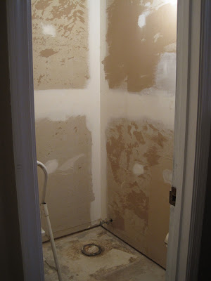 powder room gut and remove wallpaper