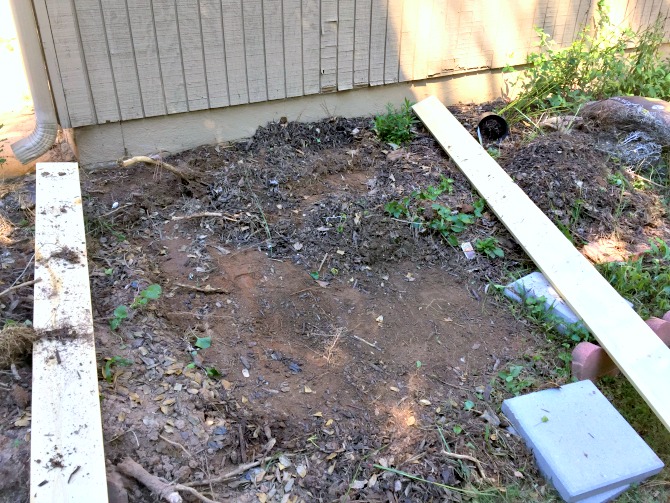 Laying a DIY Concrete Slab for Hiding City Trash Cans