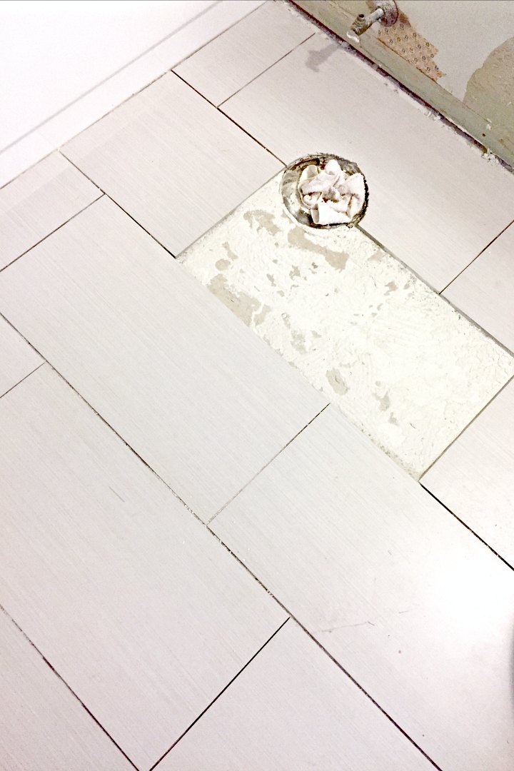 removed tile near toilet flange