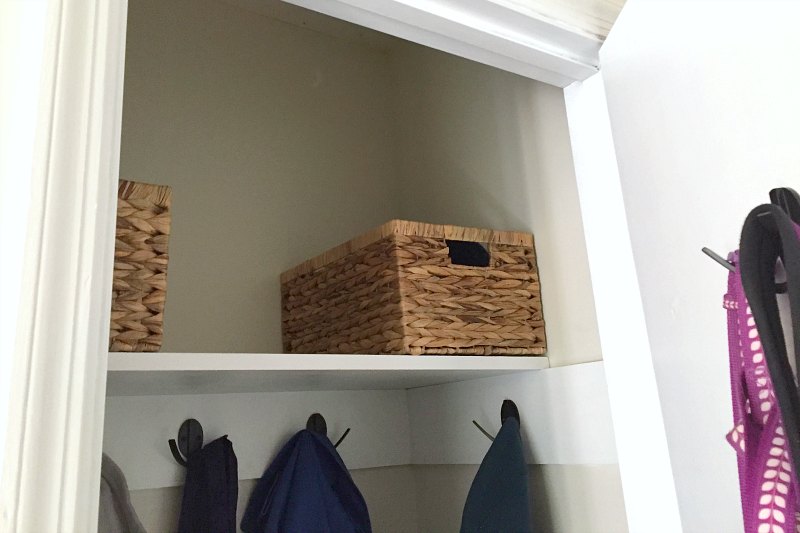 replacing storage baskets in entryway closet