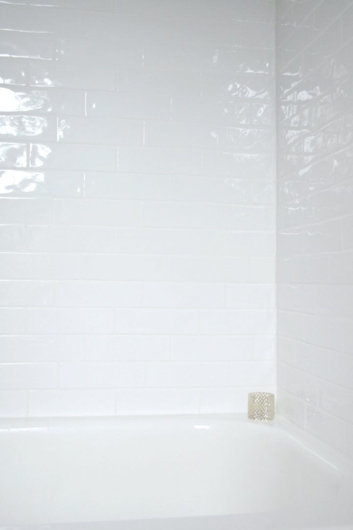 white reflection along handcrafted white tile
