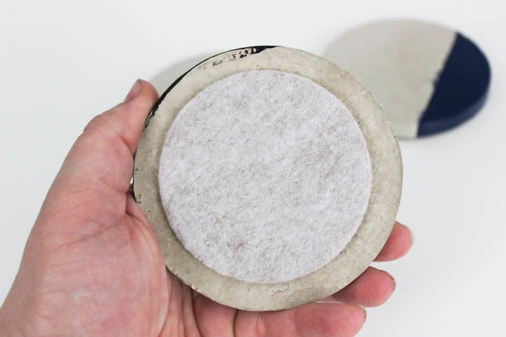 Make your own chic concrete coasters in less than an hour! This quick tutorial will show you how to make your own modern coasters without the big price tag!