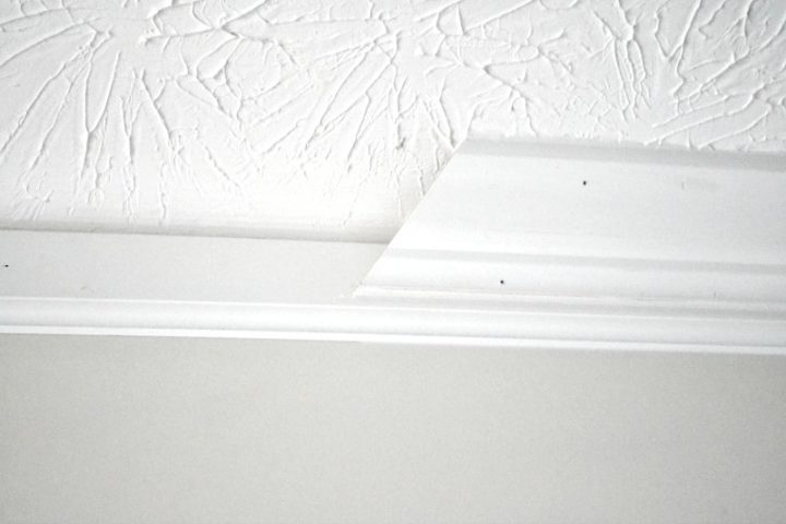 baseboard with crown on top