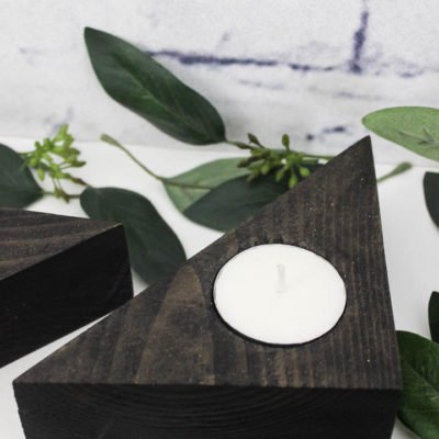 Make these unique triangle tea light holders for your home using scrap wood and a few tools. These stylish candles would look beautiful in any room in the home!