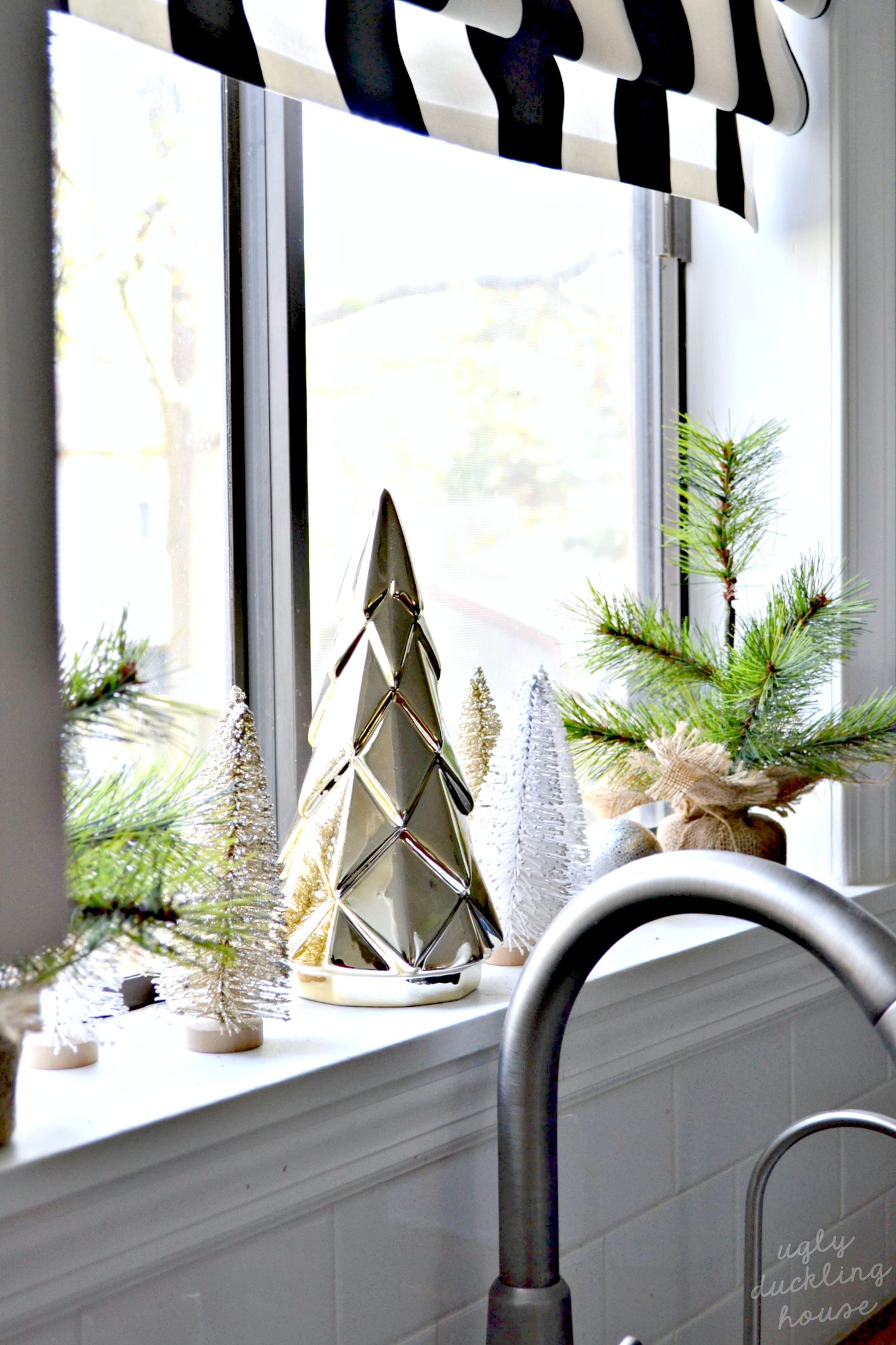 dont forget to decorate the kitchen window for christmas - gold and white neutral theme