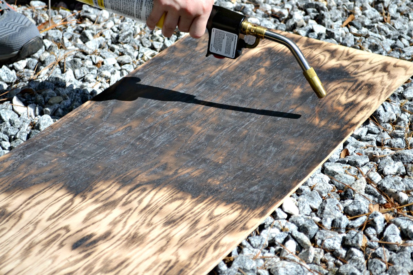 charring wood with high heat torch