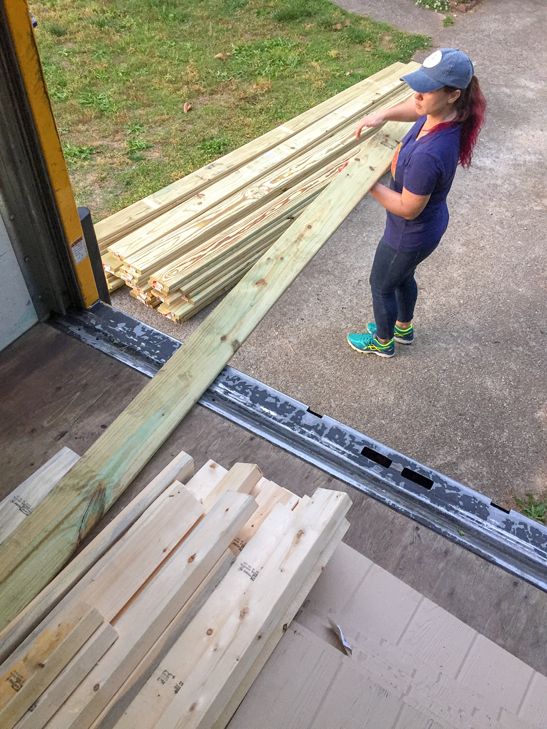 unloading lumber from truck