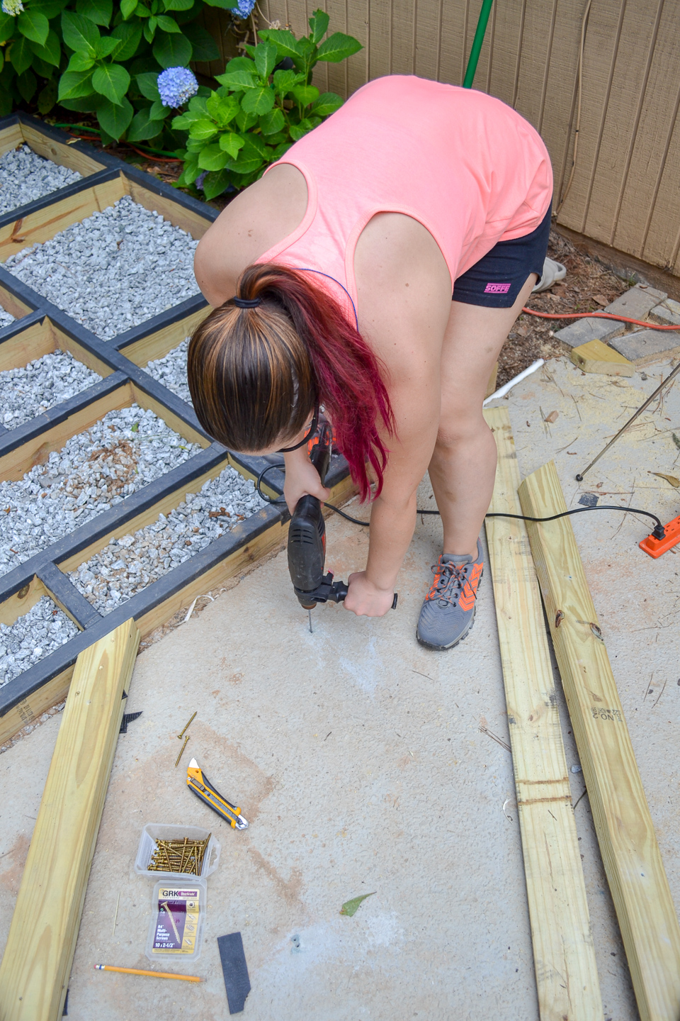 use hammer drill to drill into concrete patio