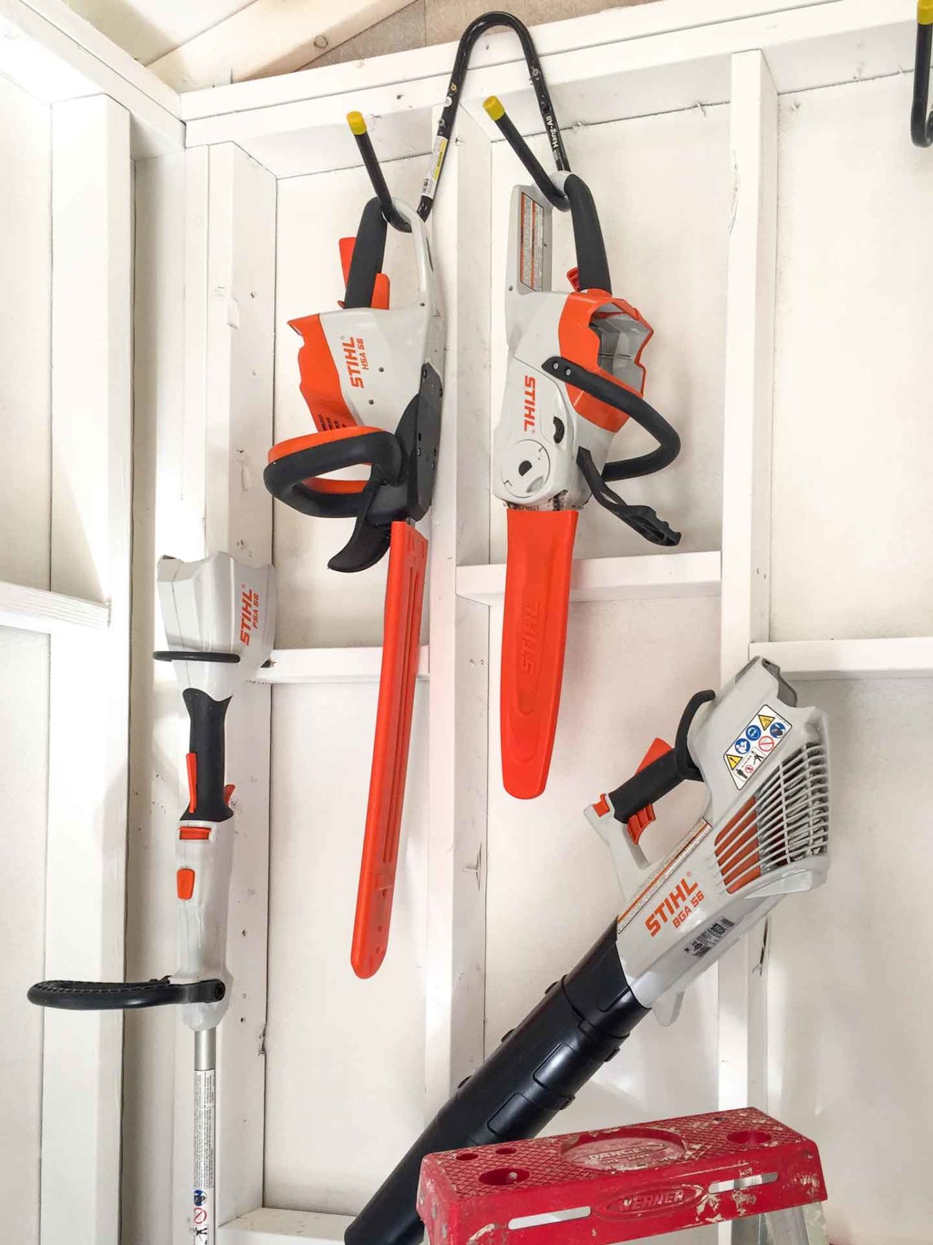 STIHL-battery-powered-tools-hanging-in-pub-shed