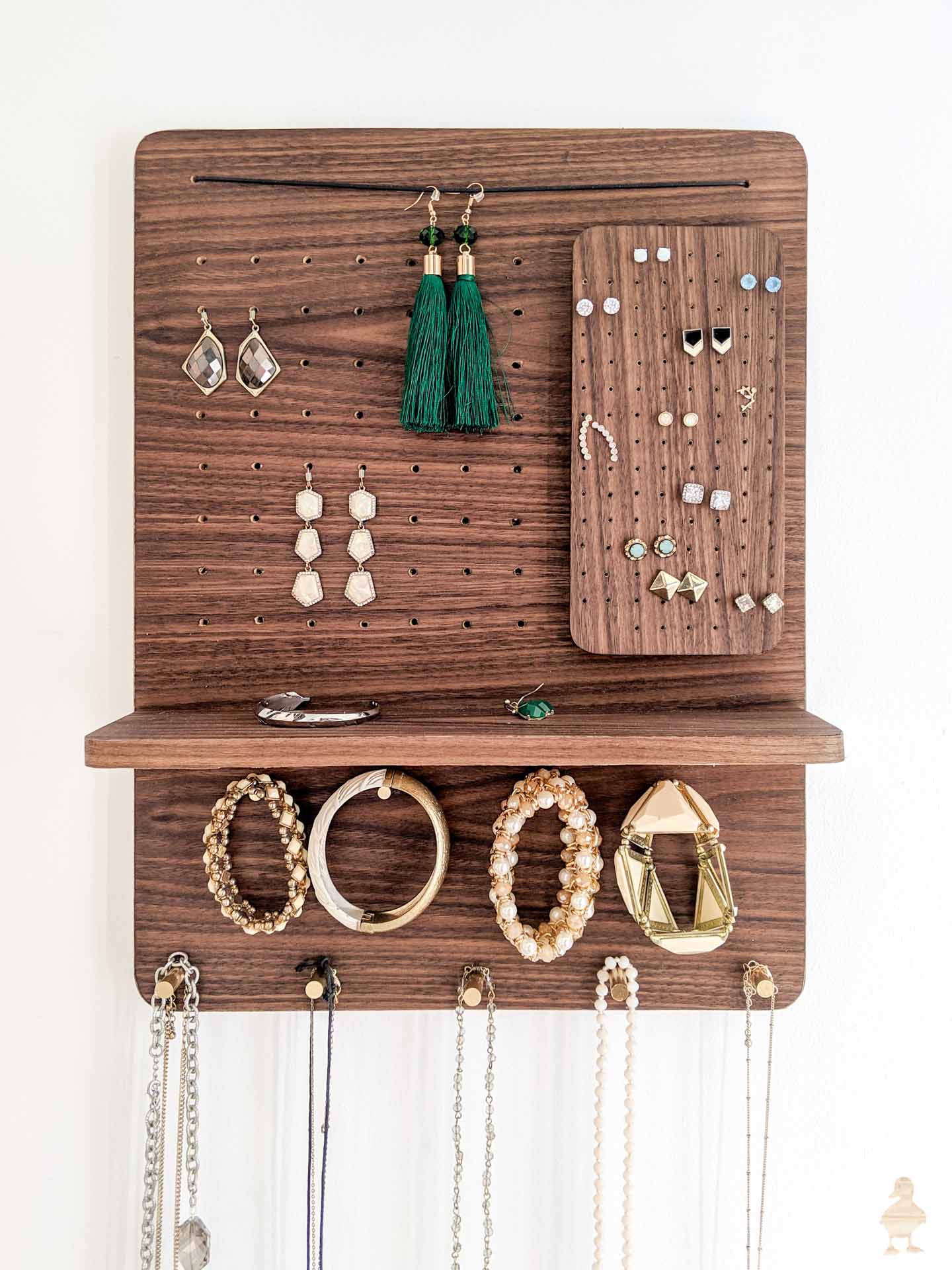 diy magnetic walnut and brass jewelry organizer idea