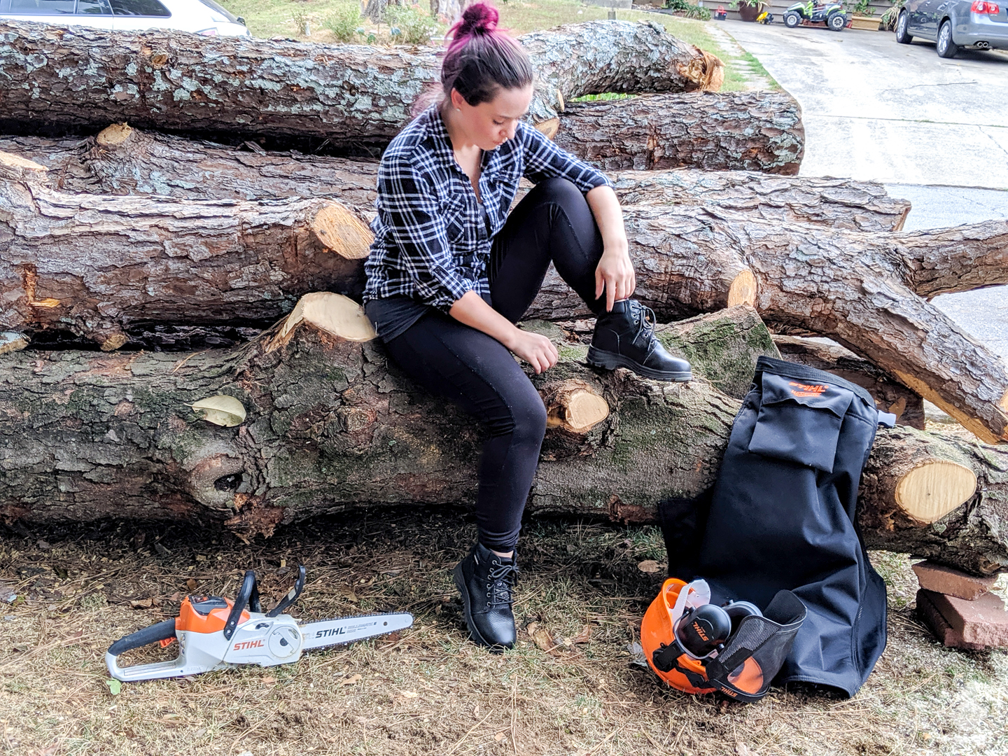 Sarah Fogle with chainsaw gear