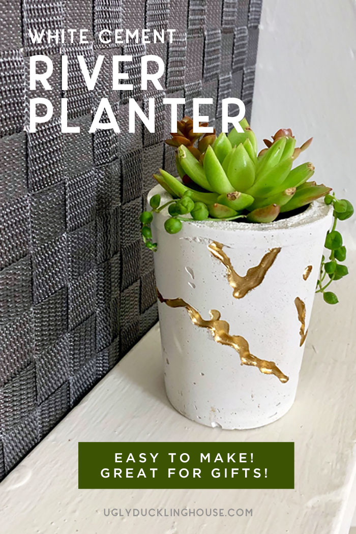 diy white cement river concrete planter with gold paint and succulent