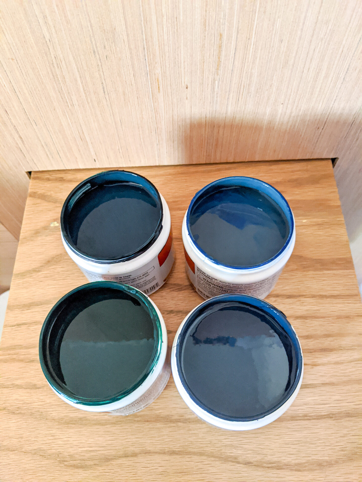 test pots of paint samples for picking the right color