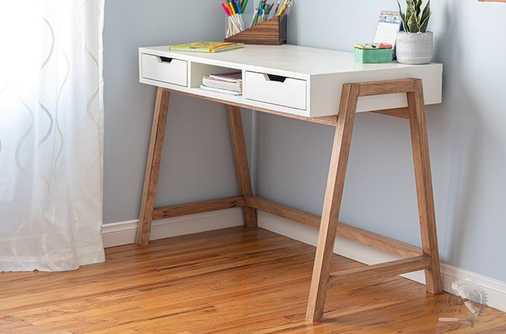 White and wood A-framed desk