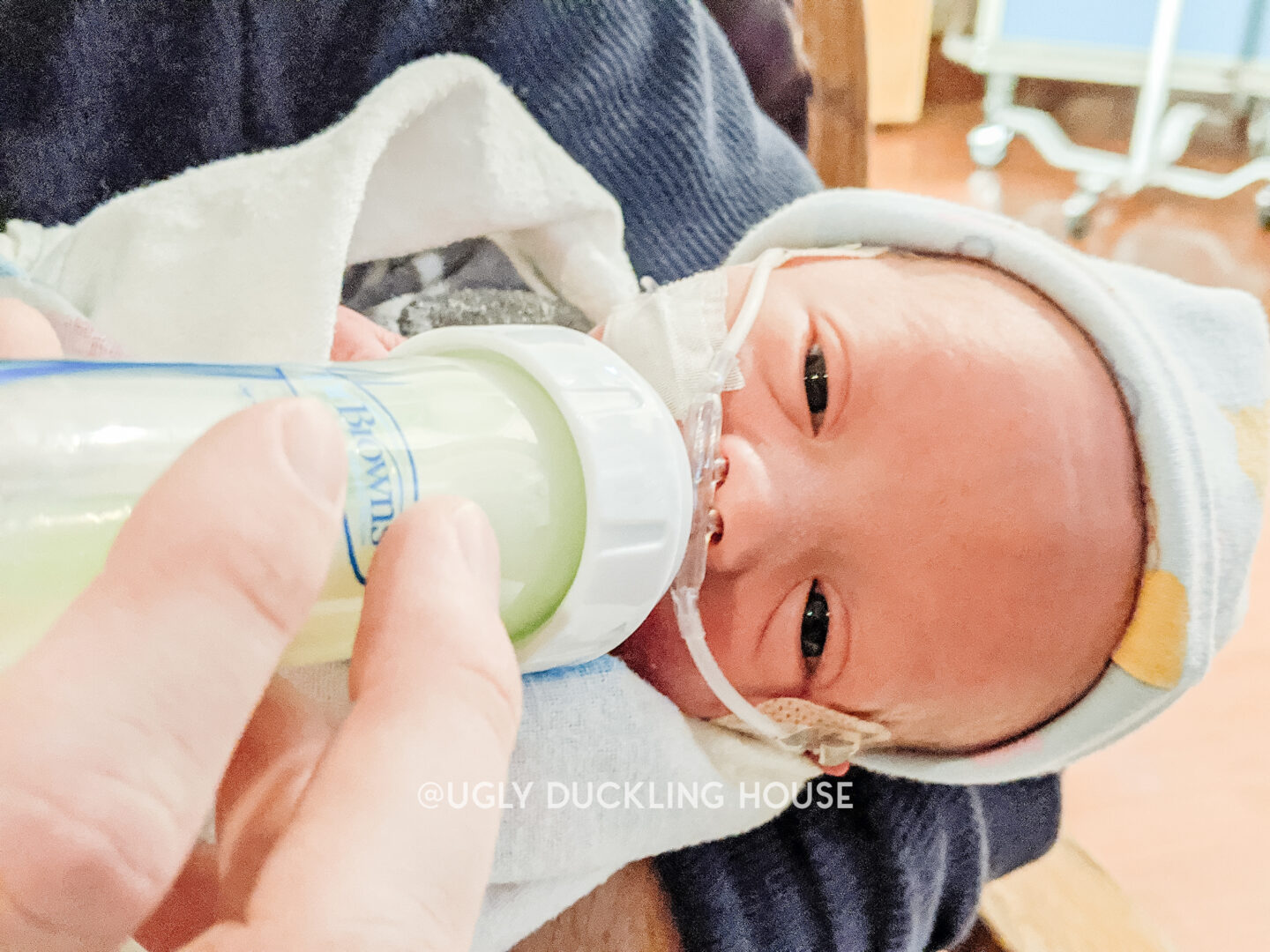 Ellis opening his eyes while bottle feeding in the NICU - Covid preemie life