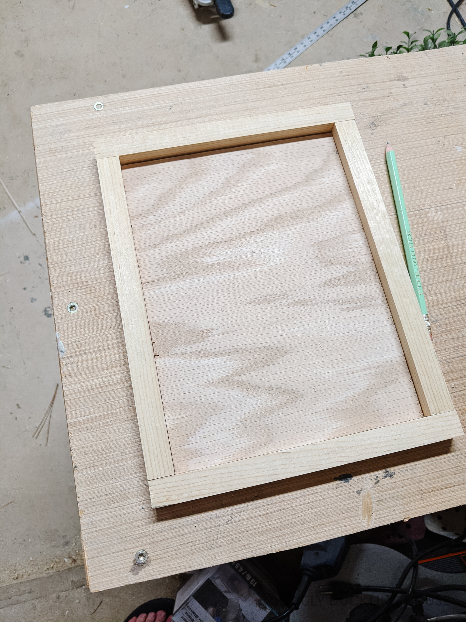 cut a frame to fit around the backer