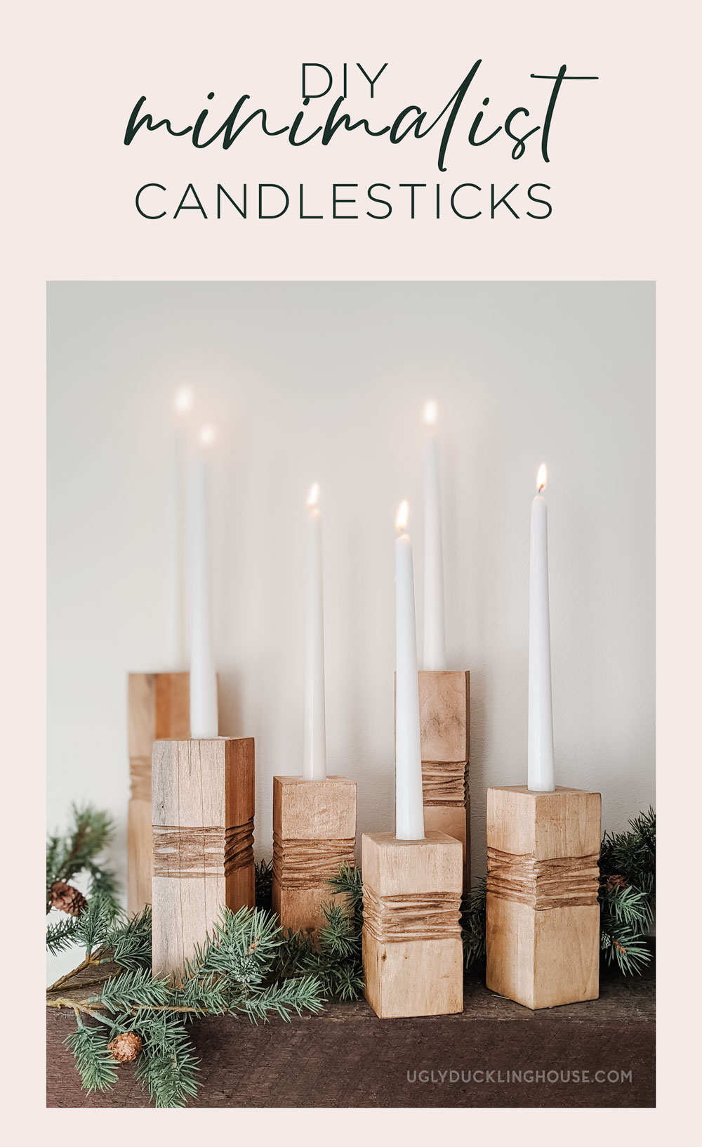 DIY minimalist wooden candle holders with tapered white candles as Christmas decor